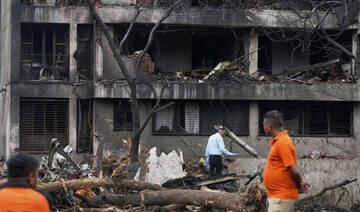 Rescuers scour buildings after Air India plane crash kills over 240